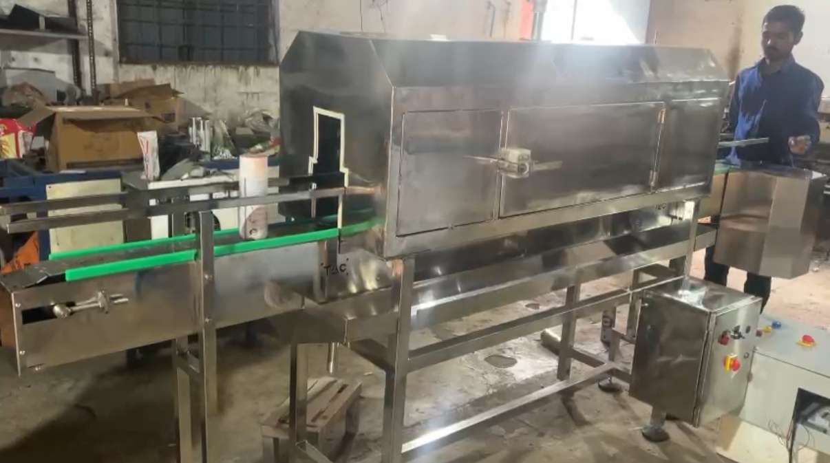 Photos of shrink conveyor from techwell automation and controll